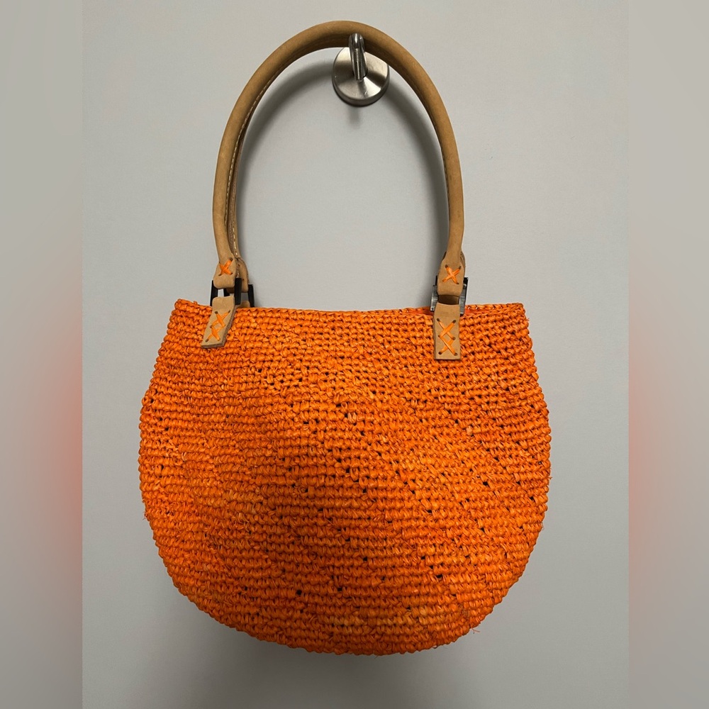 Pumpkin orange raffia bag with suede leather handles